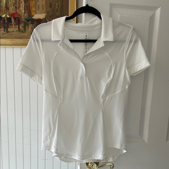 Lululemon wick drying short sleeve polo. White collar half Button Down - Picture 1 of 3